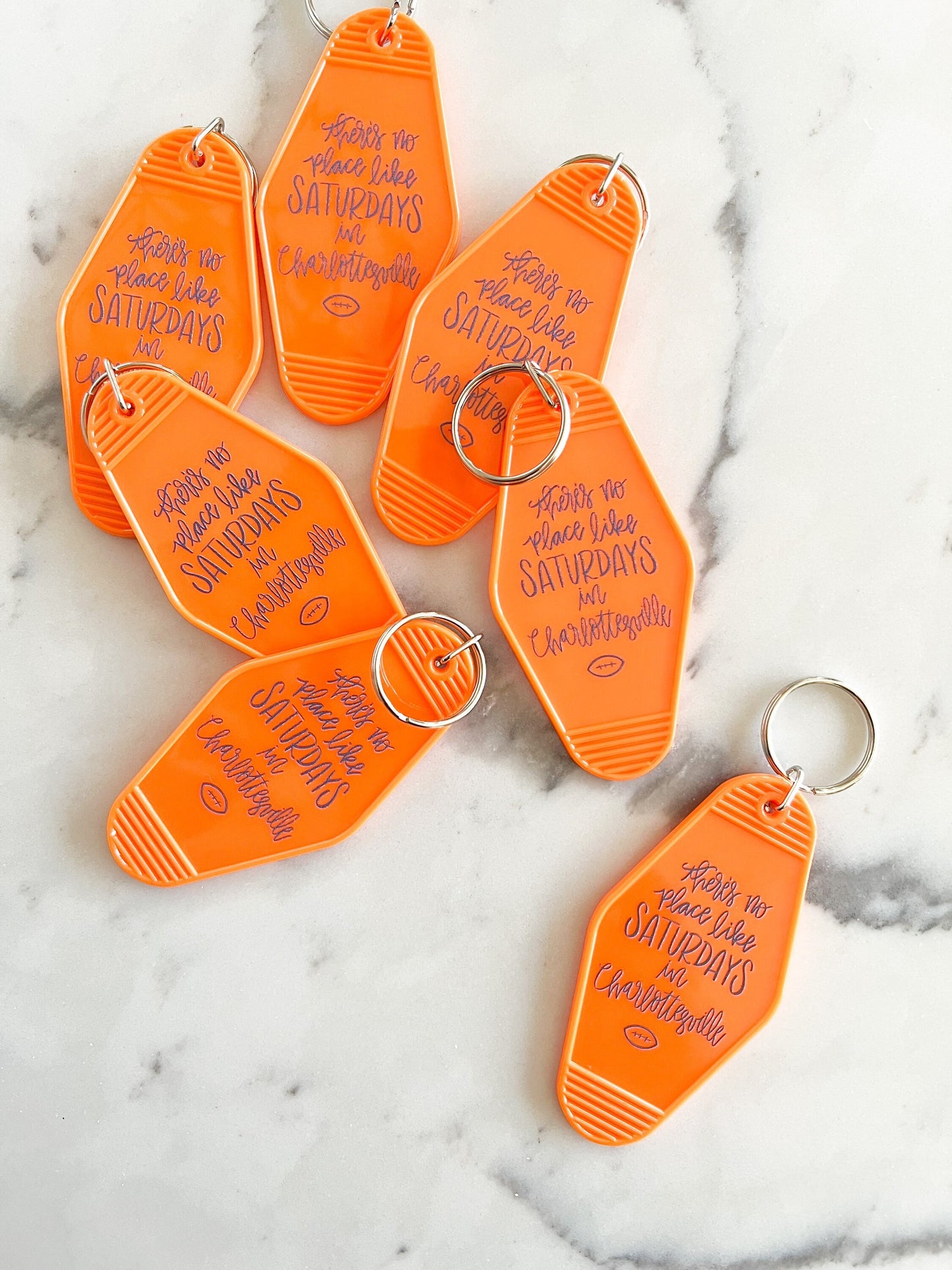 Saturdays in Charlottesville, Virginia vintage motel keychain